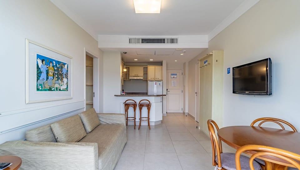 Basic Apartment | Living area | 40-inch TV with digital channels