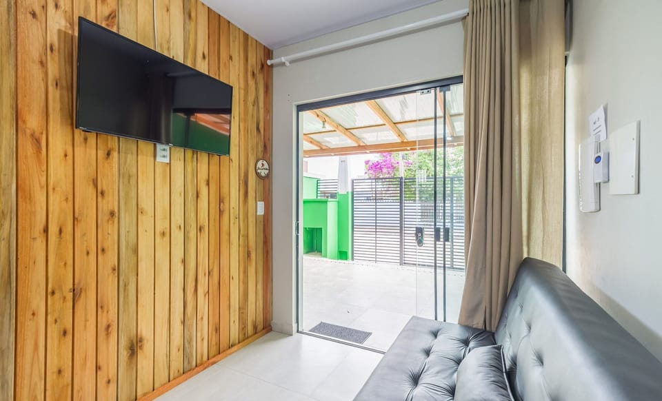 Villa | Living area | 40-inch TV with digital channels
