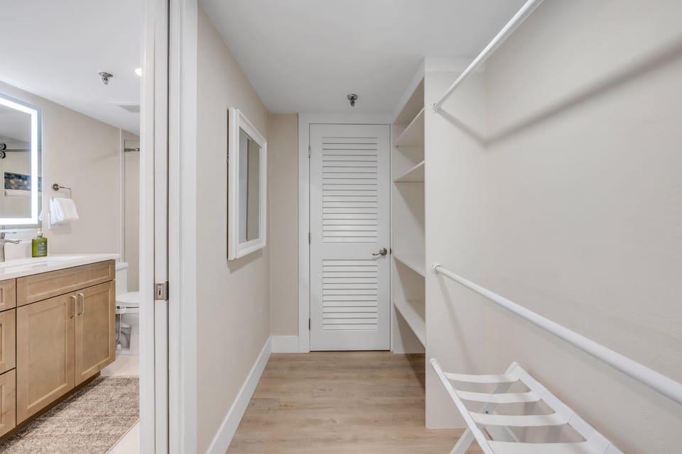 The spacious master closet offers plenty of room for storage and organization, providing a convenient and functional space to keep everything neatly tucked away