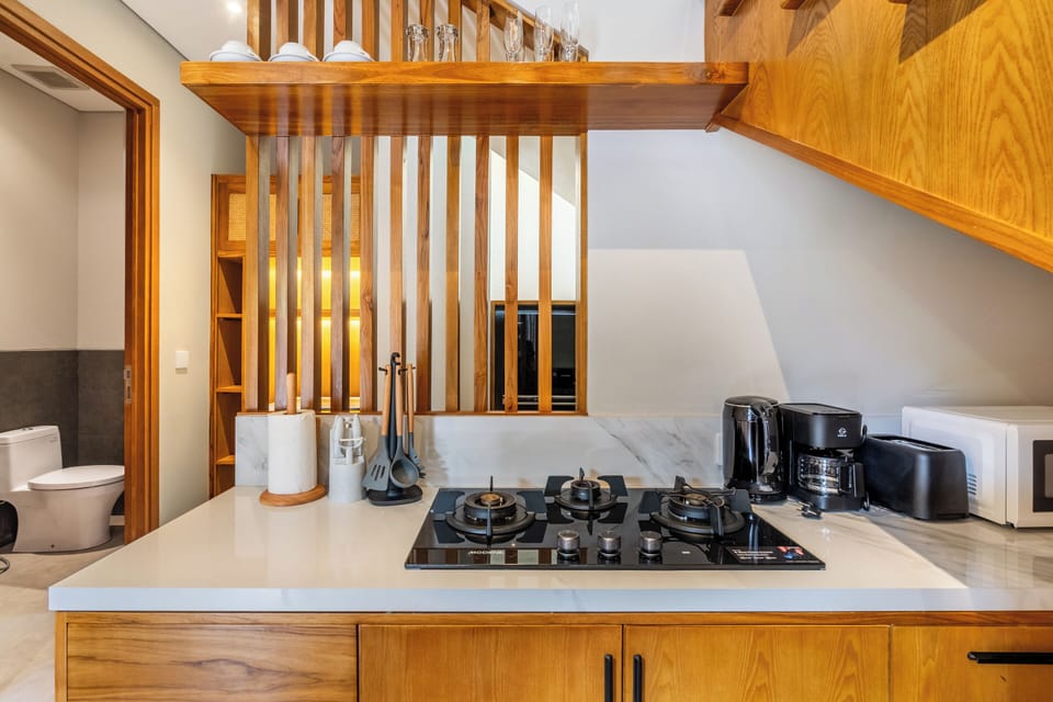 Deluxe Villa, Balcony, Pool View | Private kitchen | Coffee/tea maker, fridge, microwave, stovetop