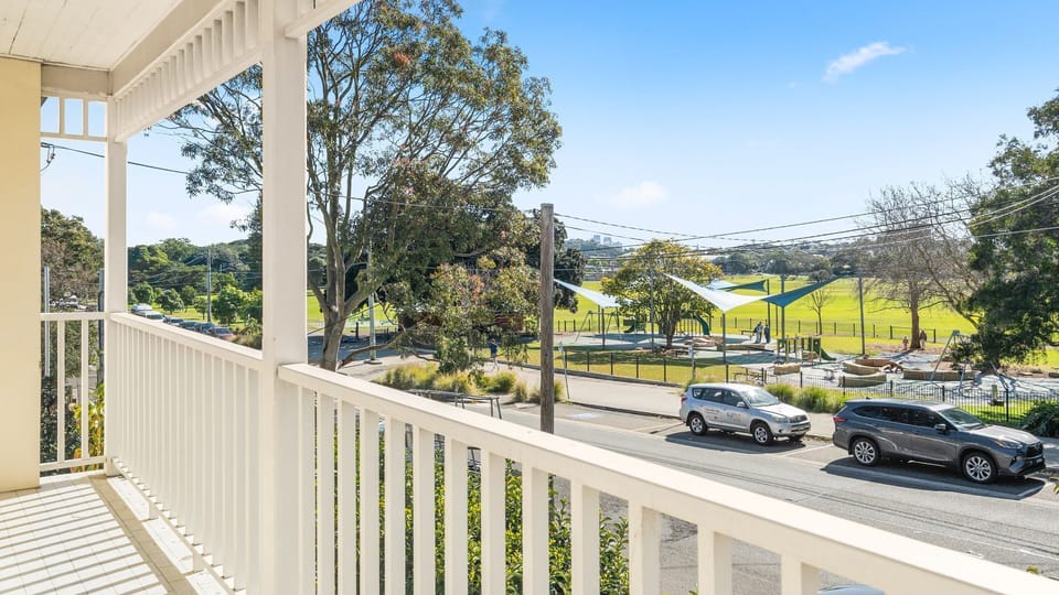 Relax on the balcony while overlooking the nearby parklands.