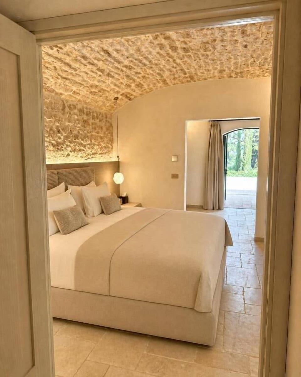 Suite, Patio, Garden View | In-room safe, desk, laptop workspace, soundproofing