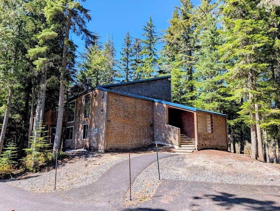 Being surrounded by trees helps this home stays cool all summer