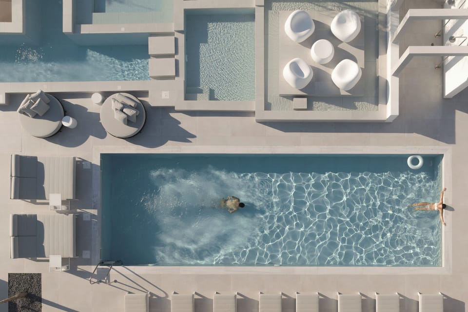 The main pool invites relaxed swims in calm, contemporary surroundings.
