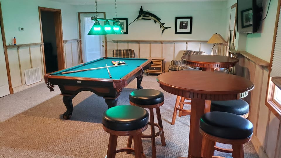 Rec Room - Recreation Room with table, stools, sofa, Pool Table