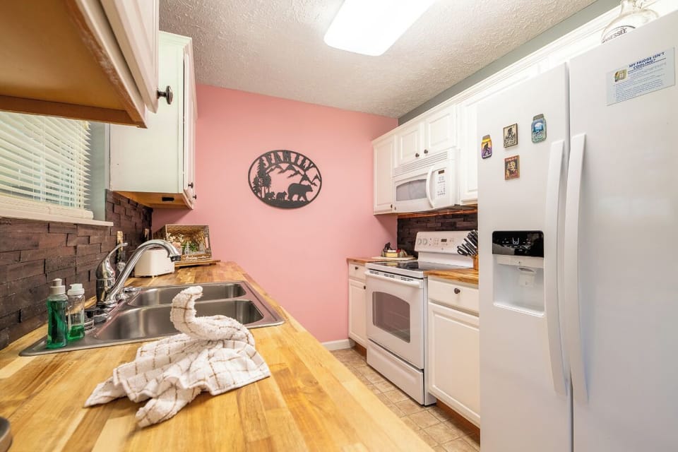 Your fully equipped kitchen features stainless steel appliances, butcher-block counters, and everything you need to cook comfortably during your stay.