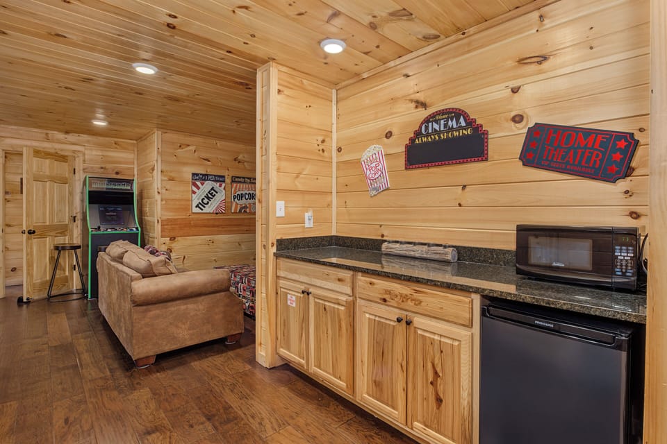 Warm wood details meet everything you need: cozy seating for downtime, a granite-topped kitchenette with microwave and mini-fridge, plus fun movie-themed decor to set the stage for your escape.