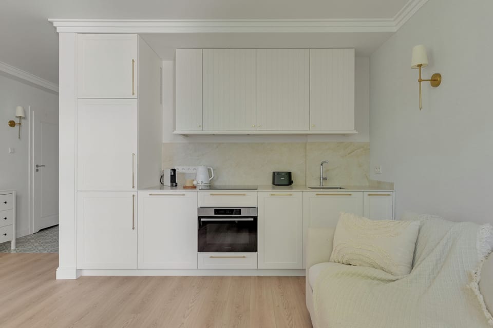Family Apartment, Balcony | Private kitchenette | Highchair, dining table