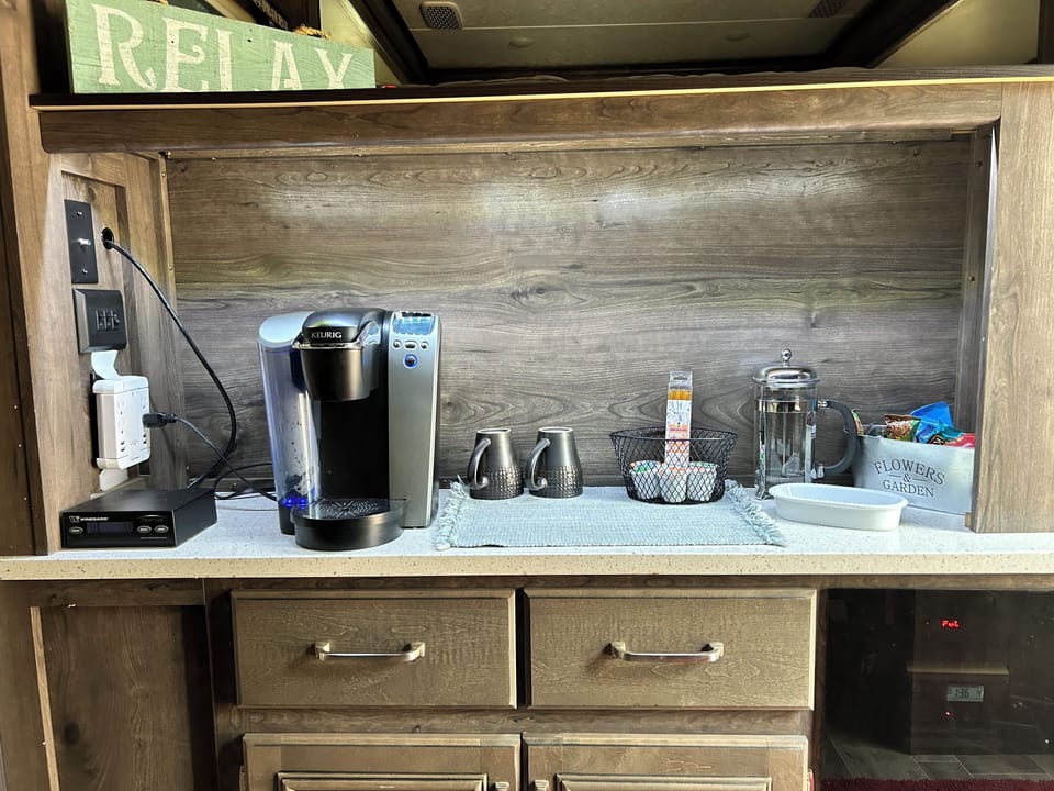 Coffee bar with Keurig coffee maker or french press.