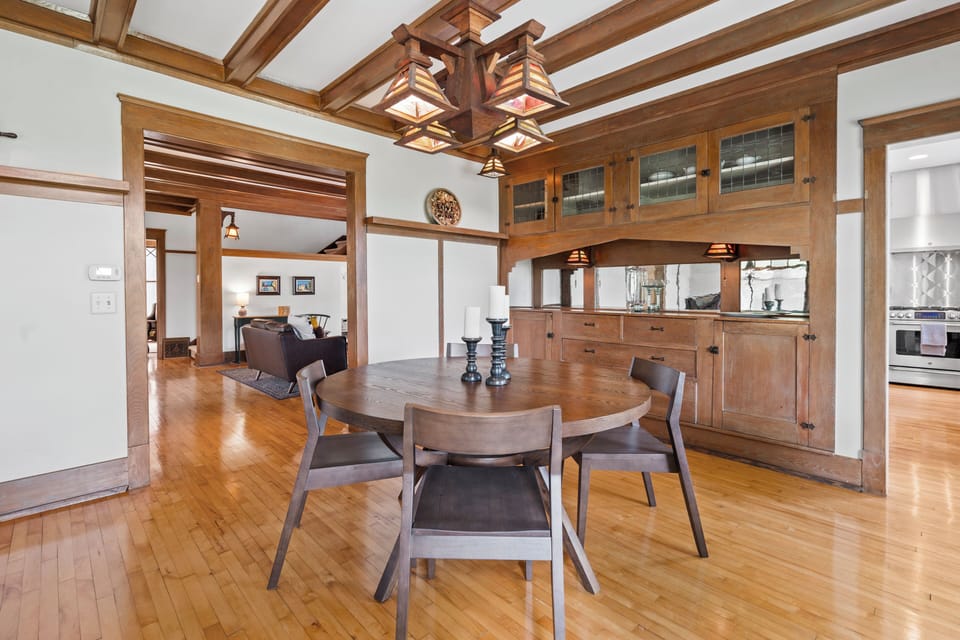 Charming craftsman dining room with built-in hutch and warm wood details