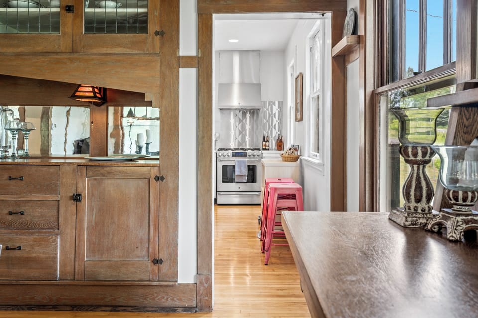Charming woodwork and a bright kitchen with stylish breakfast bar seating