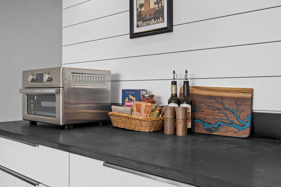 Modern kitchen counter with toaster oven and stylish guest-ready touches