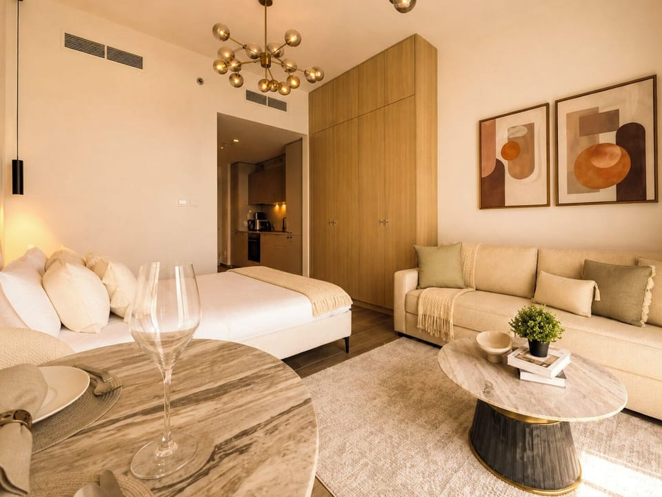 Signature Apartment, Balcony, City View | Living area | 42-inch Smart TV with digital channels