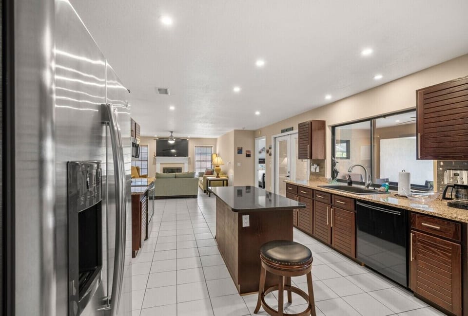 Large kitchen with stainless steel appliances