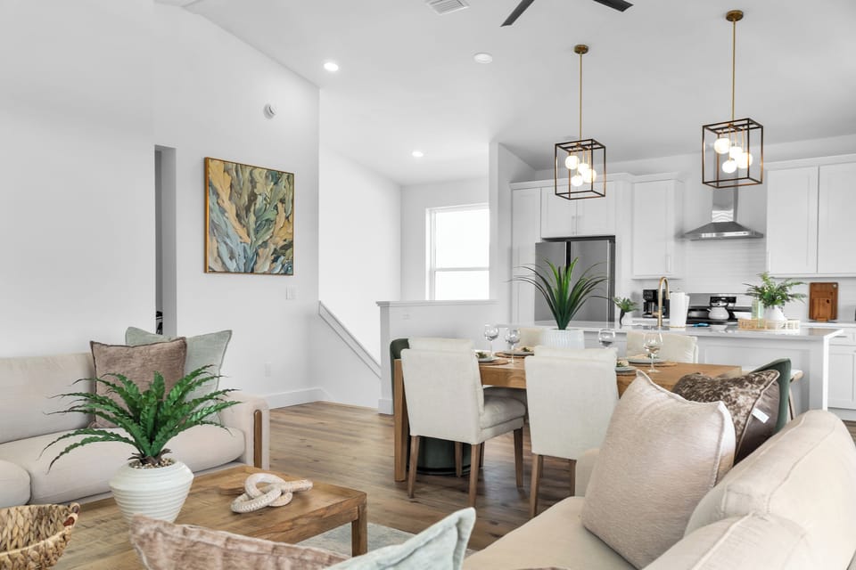 Designed for effortless entertaining! Our open-concept layout smoothly connects the spacious living room, dining table, and gourmet kitchen so everyone can hang out together. 🛋️🍷