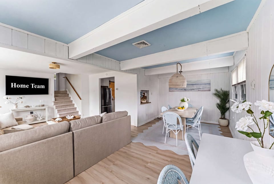 Kick back on the plush sectional or gather around the dining table — this open-concept space keeps everyone together.