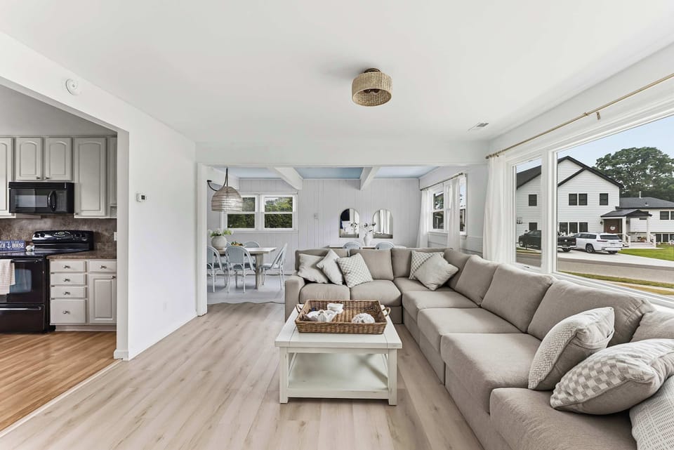 Sit Back & Relax – A warm and welcoming living area with plush seating and a cozy atmosphere.