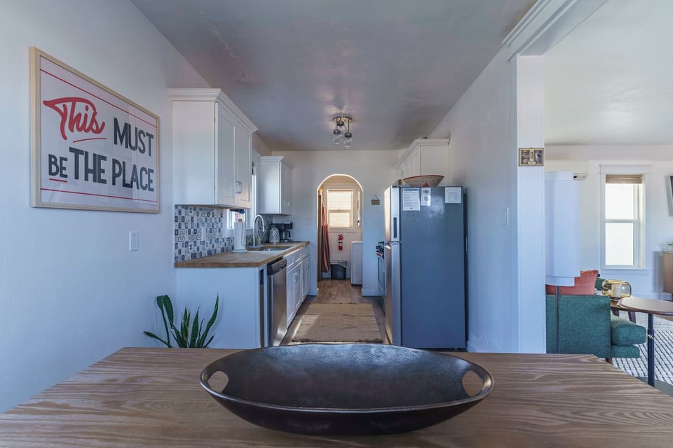 The kitchen connects easily to the dining and living areas, so everyone can stay part of the conversation.