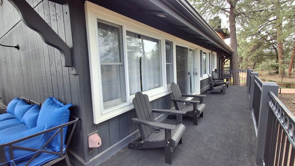 Peaceful deck outside Bedroom 2 with hammock and plenty of cozy seating, perfect for an easy afternoon