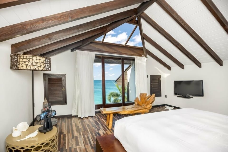 Wake up to ocean views beneath soaring vaulted ceilings.