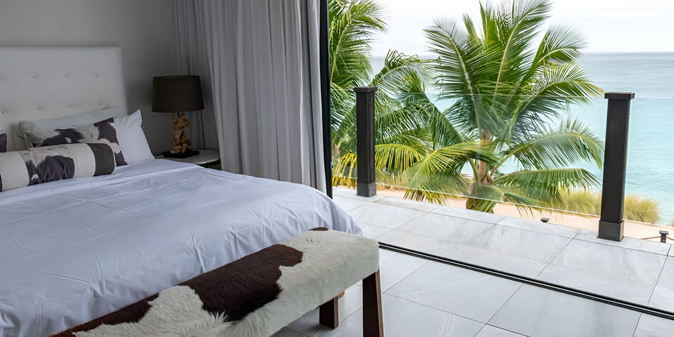 Wake up to ocean horizons spilling onto your private terrace.