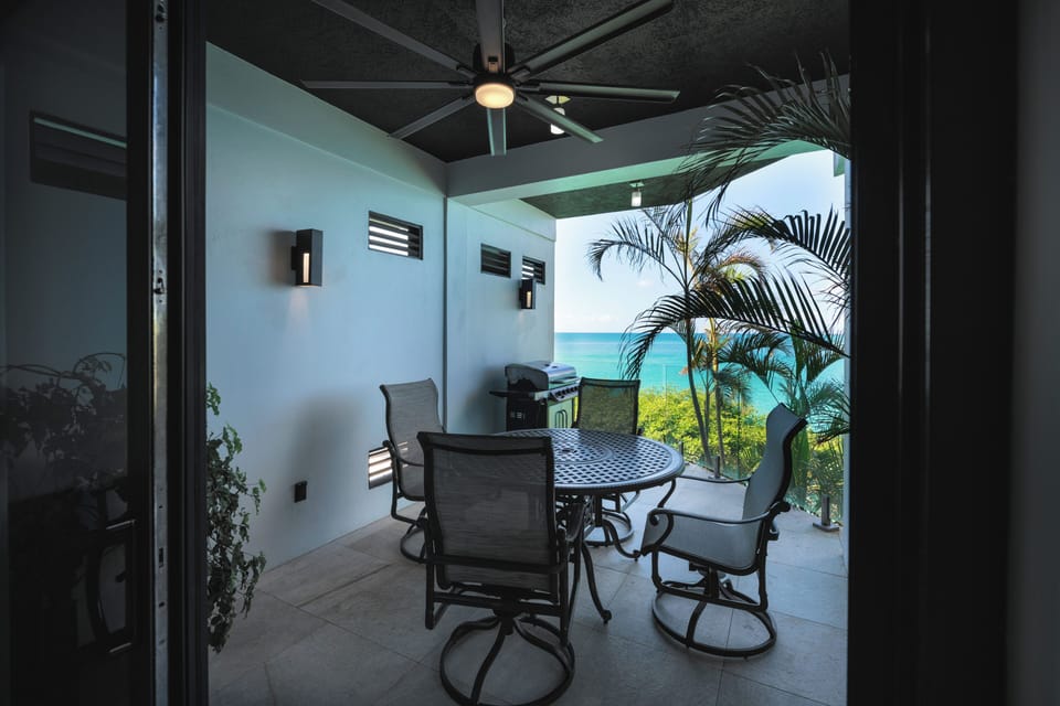 Gather for sunset dinners on the breezy terrace with sea views.