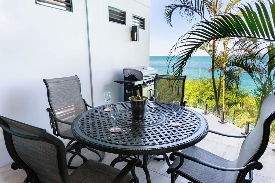 Savor sunset cocktails alfresco with sweeping ocean views.