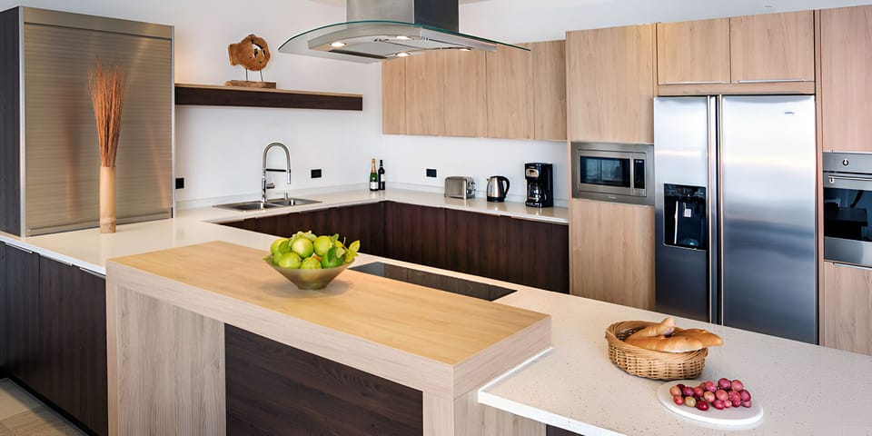 Gather around the island and cook with upscale modern appliances.