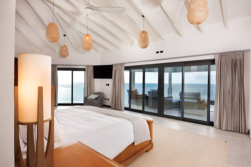Wake to sweeping ocean views from a serene king bed.