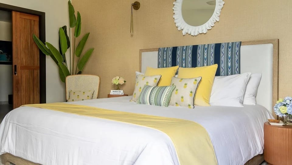 Wake up to panoramic Caribbean views from the comfort of your elegant bedroom.