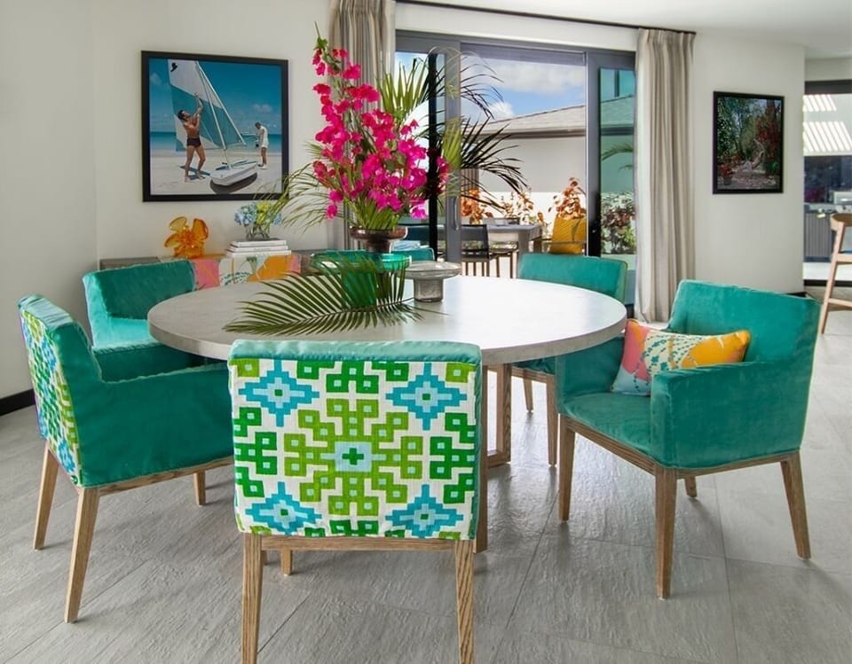Linger over dinner in a vibrant dining space with views.