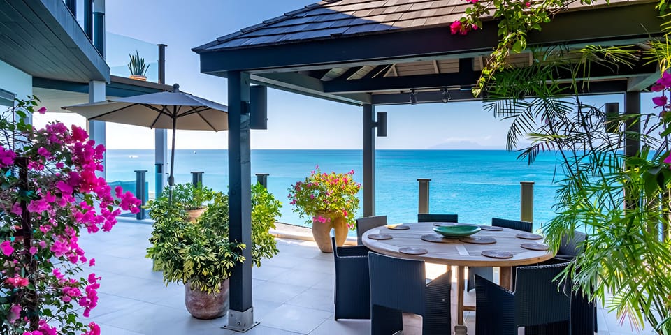 Savor long outdoor dinners framed by vibrant ocean blues.