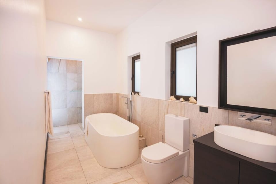 Soak in a deep tub after a sun-filled day.