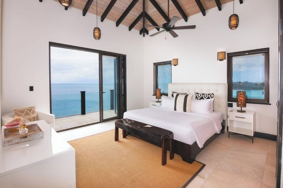 Lounge by open sliders as ocean breezes cool the room.