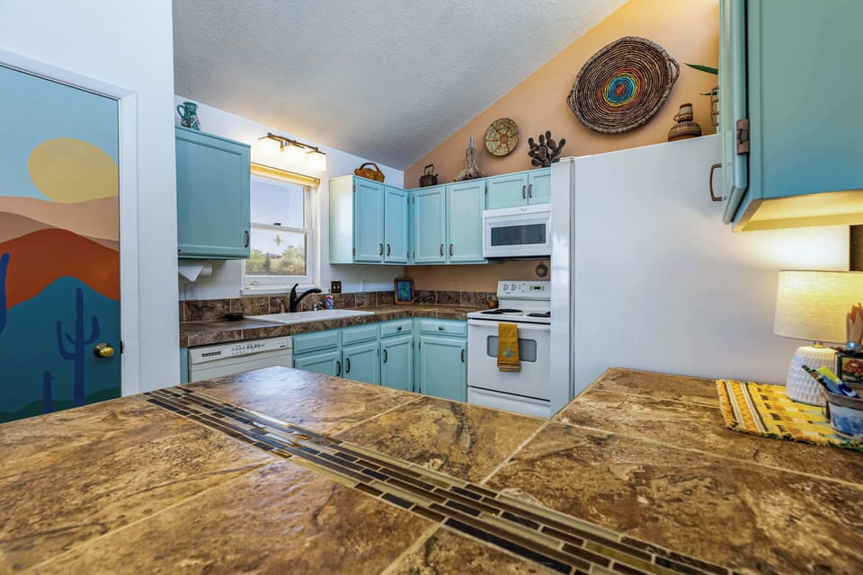 Spread out on tile counters with full size appliances at hand