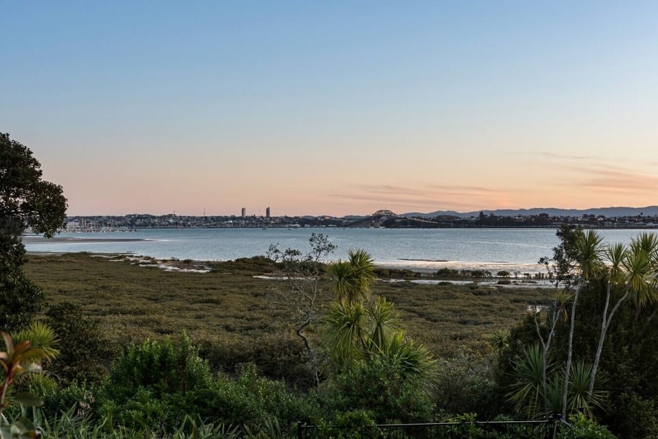 City and water views from the home at sunset