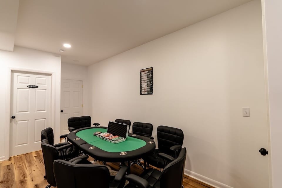 Private poker room with pro-style table and comfy seating for game nights