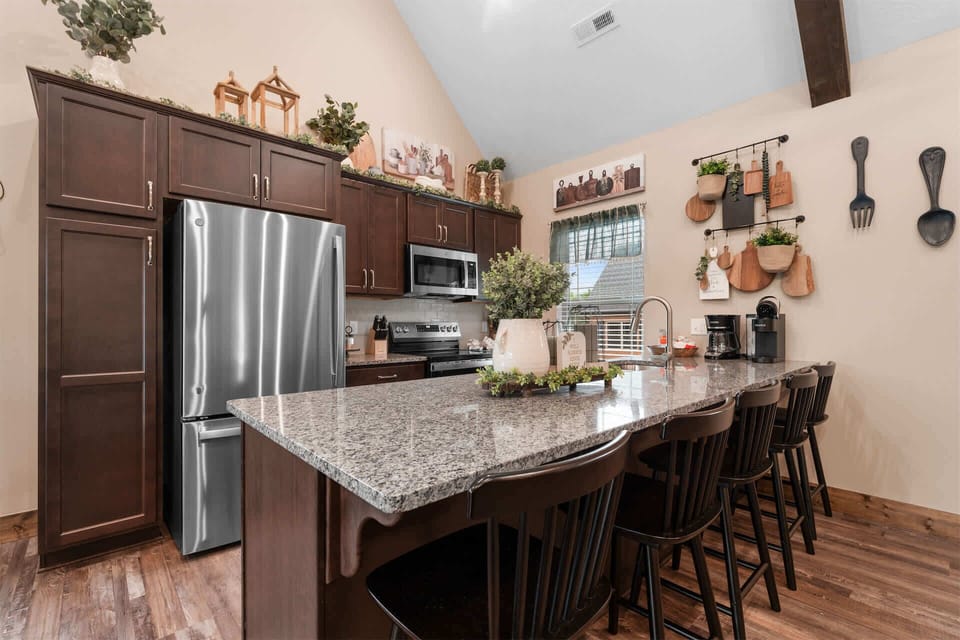 Fully equipped kitchen with convenient counter seating for casual meals