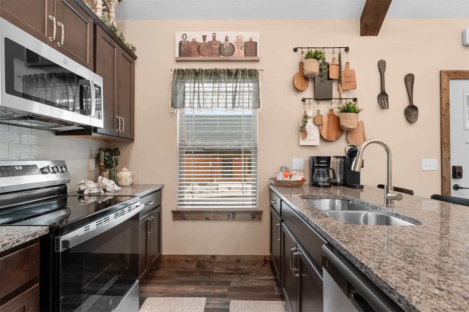 Fully equipped kitchen with convenient counter seating for casual meals