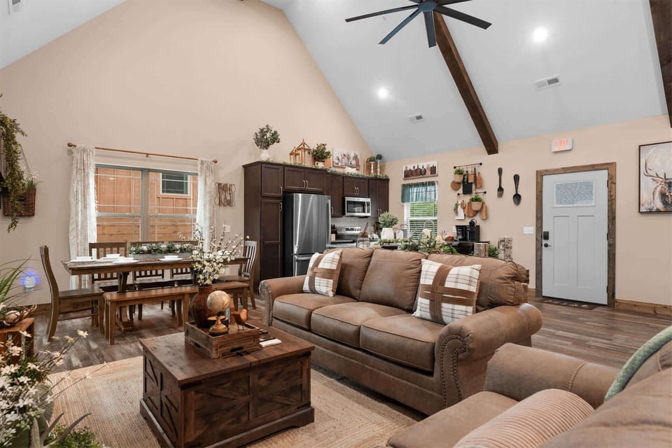 Relax and unwind in this open living space featuring a smart TV and comfortable sofa sleeper