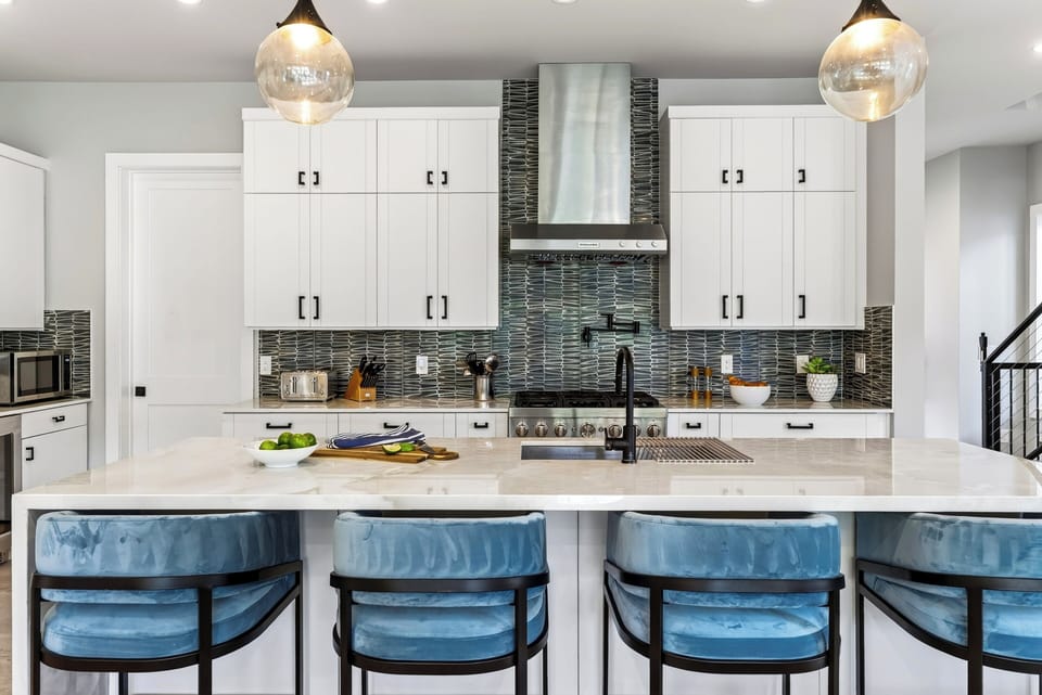 Chef's kitchen with a statement tile backsplash