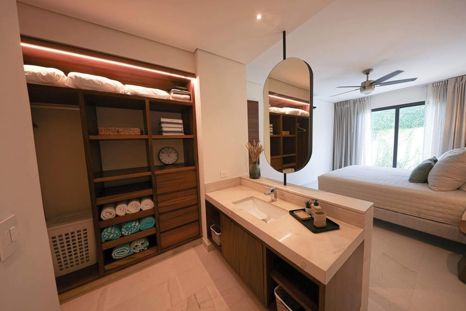 Ensuite bathroom with closet space