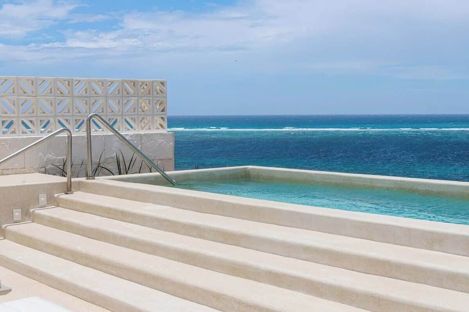 Shared pool on the rooftop with amazing ocean views