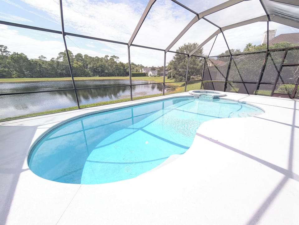 Relax by the private pool while taking in beautiful water views right from the backyard.