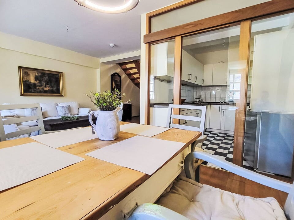 Furniture, Interior Design, Flooring, Floor, Wood, Ceiling, Chair, Room, Lighting, Kitchen & Dining Room Table