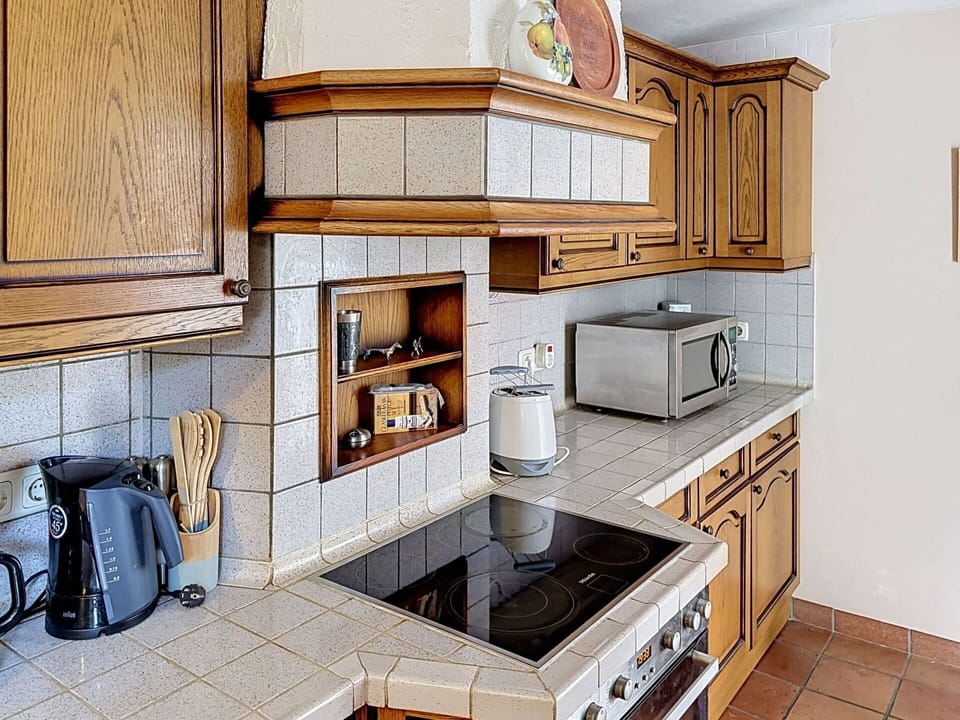 Kitchen, Countertop, Cabinetry, Kitchen Appliance, Interior Design, Flooring, Wood, Furniture, Major Appliance, Floor