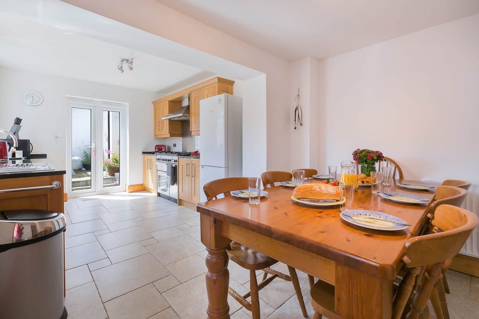 Large dining kitchen, Dishwasher, Range with Gas hob, electric oven,    Fridge Freezer,  High Chair