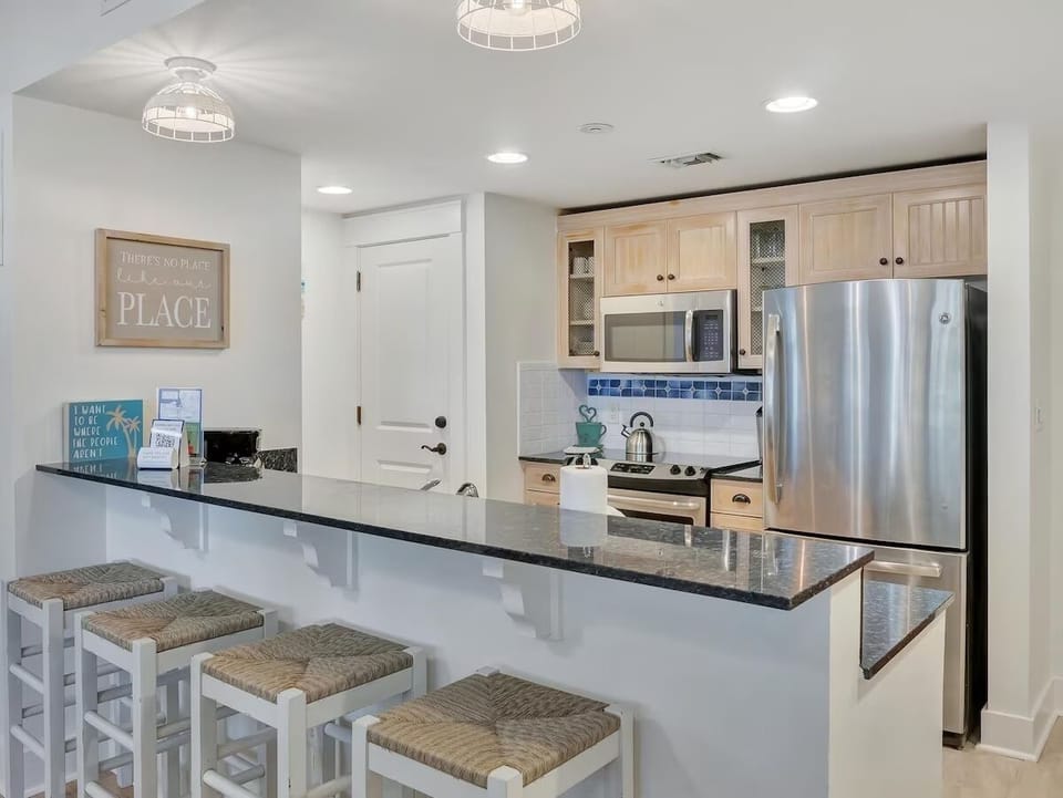 Bright open kitchen with breakfast bar