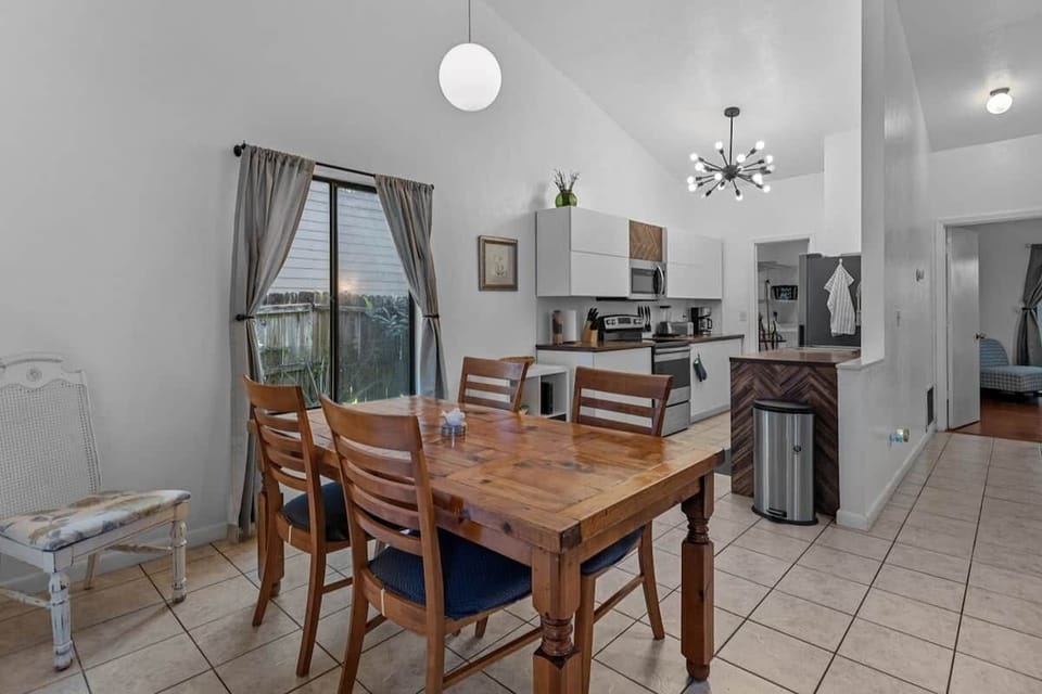 Open dining area with access to kitchen and living room.