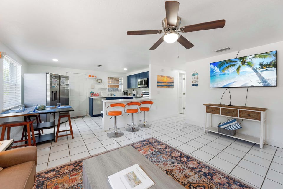 Comfortable seating and Smart TV for entertainment.